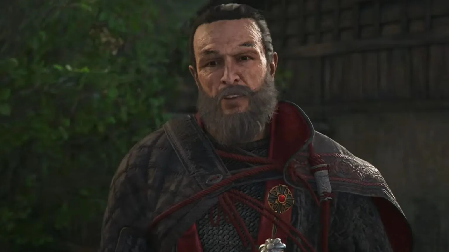 Gray bearded man speaks